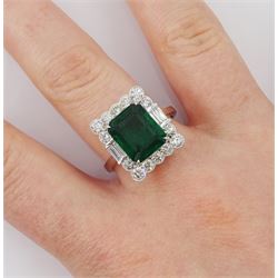 18ct white gold emerald cut emerald, round and baguette cut diamond cluster ring, stamped 750, emerald 3.58 carat, total diamond weight 1.03 carat, with World Gemological Institute Report
