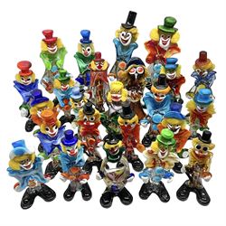 Large quantity of Murano glass clowns, to include larger examples, in two boxes