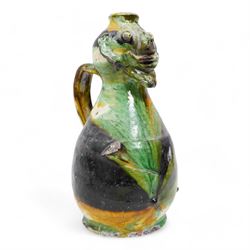 Two early 20th century Italian glazed terracotta wine flasks, one of twin handled form, applied with shells and insects, the other formed as a male figure, H24cm (2)
