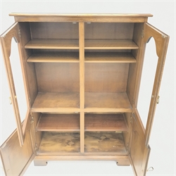 Jaycee - medium oak display cabinet, two glazed doors enclosing two shelves above two panelled cupboards, shaped bracket supports, W94cm, H140cm, D33cm