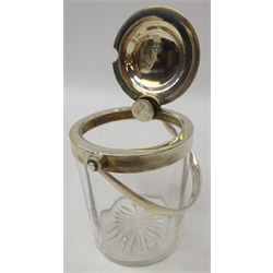  Silver mounted glass preserve jar by Asprey & Co Ltd, Birmingham, 1919, with patent action swing handle, 15cm  
