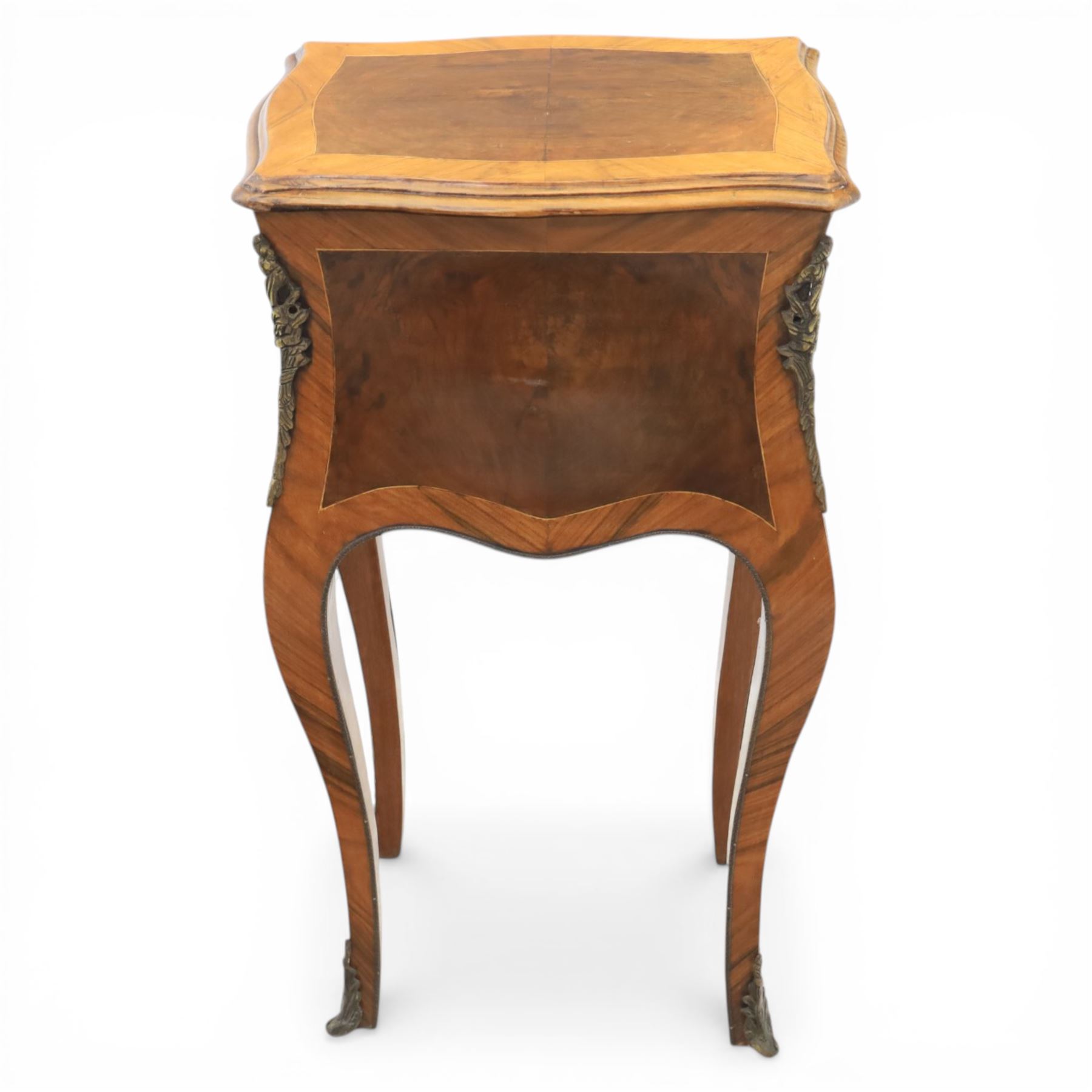 Louis XV style kingwood bedside chest, shaped and crossbanded top above two bombe drawers with cast brass handles, the sides applied with ormolu mounts, on slender cabriole legs terminating in metal sabots