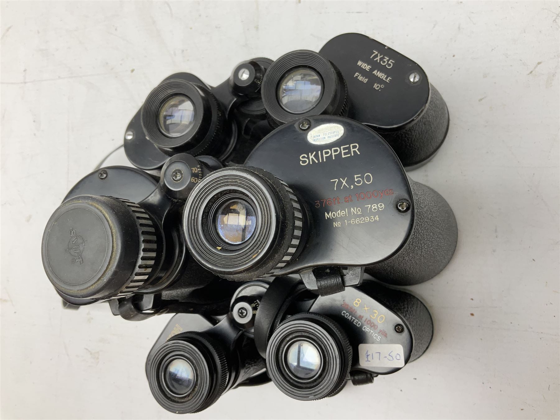 Twelve pairs of binoculars to include BWCF 7x35 Extra Wide Angle, Carl Zeiss Jena Delturis 8x24, Carl Zeiss Jena Jenoptem 8x30W, Chinon Countryman 10x50,  Ajax 8x30, Regent 16x50, etc,  some with cases