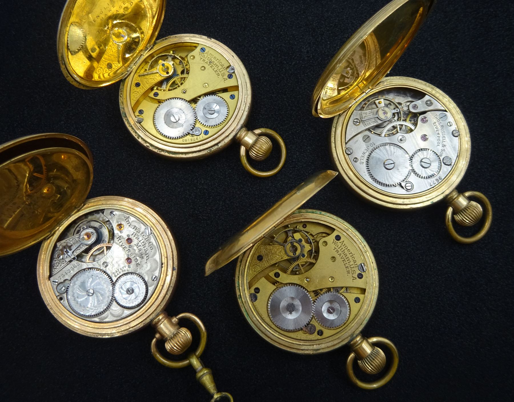 Four goldplated full hunter lever pocket watches including American Watch Company Riverside and