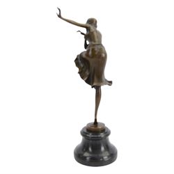 After Dimetri H Chiparus; Art Deco style bronze, modelled as a dancing flapper girl, upon black marble socle base, overall H40cm