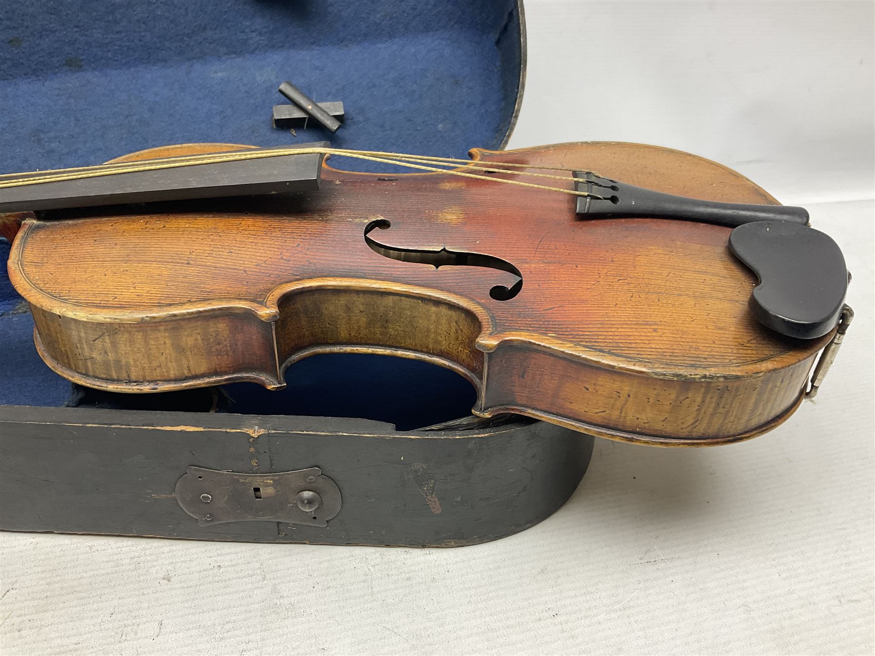 Late 19th century French three-quarter size 'Conservatory' violin with 34cm two-piece maple back and ribs and spruce top, the peg box inscribed 'Conservatory Violin Straduari', bears label 'Antonius Stradiuarius Cremonensis Faciebat Anno 1721' L55.5cm overall; in ebonised wooden 'coffin' case