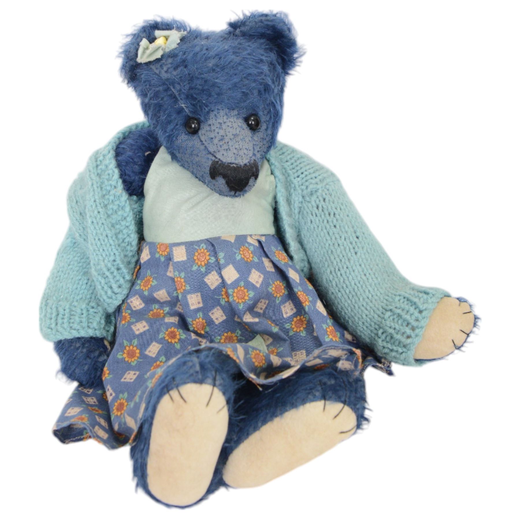 Eight early 20th century and later teddy bears, to include three straw filled examples with jointed limbs, tallest H58cm