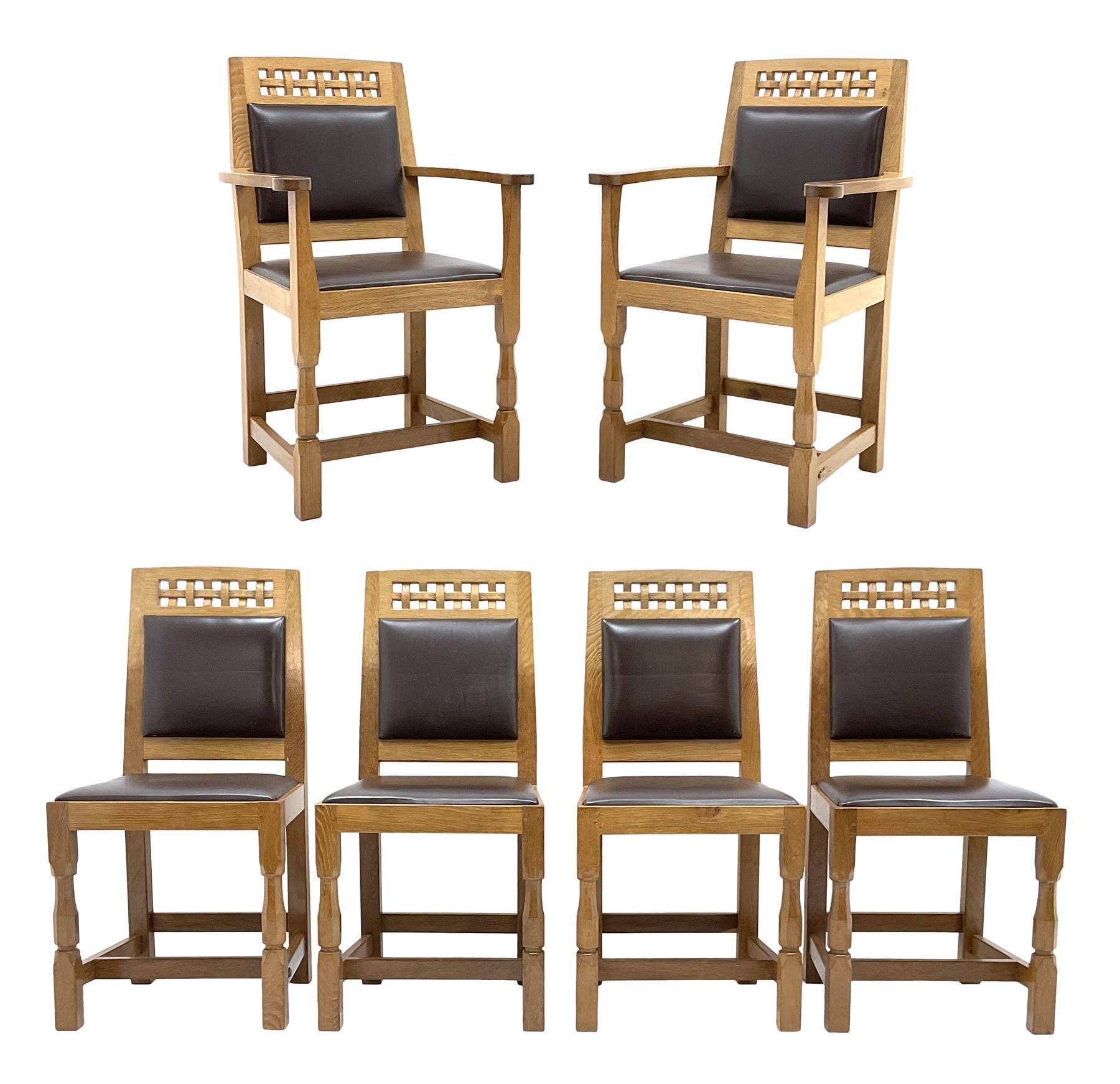 'Lizardman' set six dining chairs, two carvers and four side chairs, carved and pierced lattice top rail over cushioned back and drop in seat upholstered in brown leather, by Derek Slater of Crayke