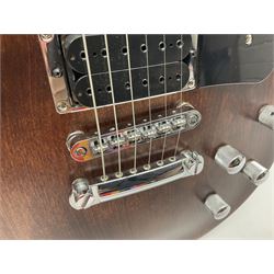 2012 American Gibson Les Paul Studio electric guitar, retro fitted with iron gear pick-ups, push-pull 'pots', roller bridge, string butler and locking machines, serial no.115321594, L99cm overall; in Gibson soft carrying case.