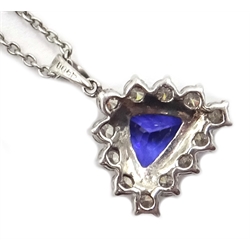  18ct white gold tanzanite and diamond cluster pendant, stamped 750 on platinum chain necklace, stamped 950, tanzanite 2.5 carat, diamonds approx 0.6 carat  