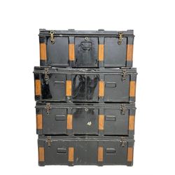 Set four early to mid-20th century metal and wood-bound travelling trunks (three at: W94cm, H32cm, D49cm; one at: W85cm, H32cm, D49cm)