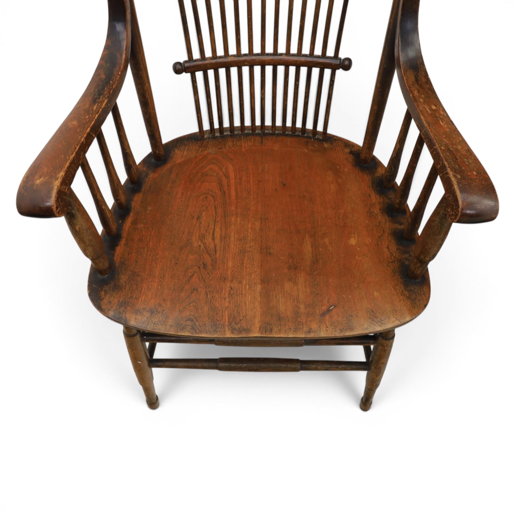 Set of eight 19th century ash and elm spindle back Windsor armchairs, arched top rails above fan-shaped spindle backs, curved arms with turned supports, shaped saddle seats, on turned legs joined by H-stretchers