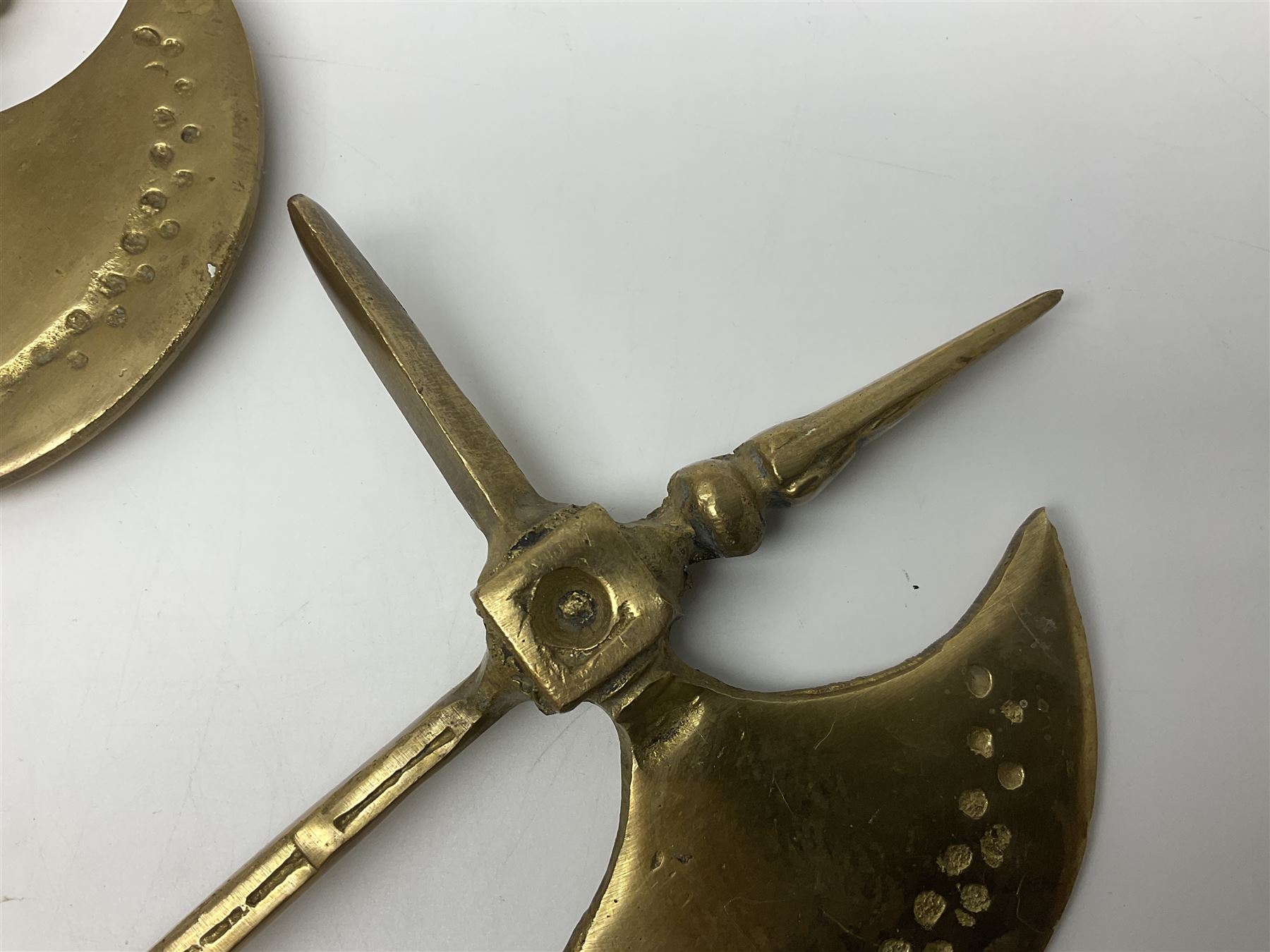 Ornamental cast-brass double-headed axe, together with another similar, H44cm