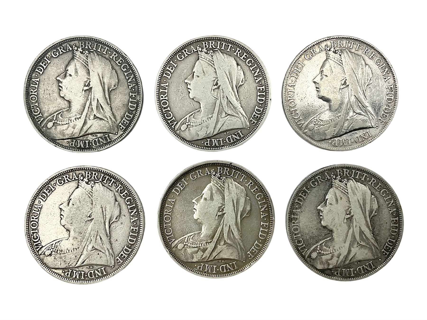 Six Queen Victoria silver crown coins, dated 1893, two 1896, 1898, 1899 and 1900