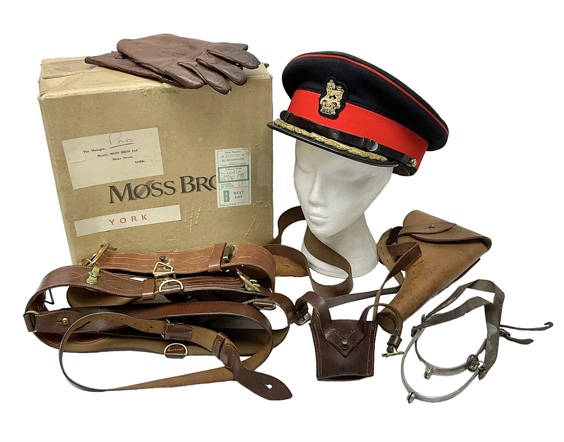 British Army General Staff officer's peaked cap by Herbert Johnson London in Moss Bros. delivery box; two officer's Sam Browne leather belts; leather pistol holster and sword hanger; pair of leather gloves and pair of spurs