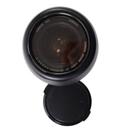 Eight camera lenses, comprising Canon Ultrasonic Zoom EF 75-300mm 1:4-5.6 lens, AF Nikkor 35-70mm 1:3.3-4.5 lens, Nikkor 60-180mm 1:4.5-5.6 lens, Canon Zoom EF 28-80mm 1:3.5-5.6 lens, Canon Zoom EF 80-200mm 1:4.5-5.6 lens, Sigma 70-300mm 1:4.6-5.6 DL Macro, Sigma Zoom 70-210mm 1:4-5.6 UCII lens and a Sigma AF 70-300mm 1:4-5.6 APO Macro lens, all with lens caps