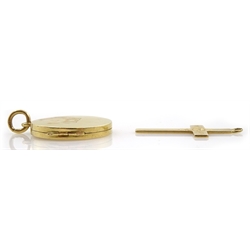 Gold circular locket and a gold cross, both hallmarked 18ct, approx 7.8gm