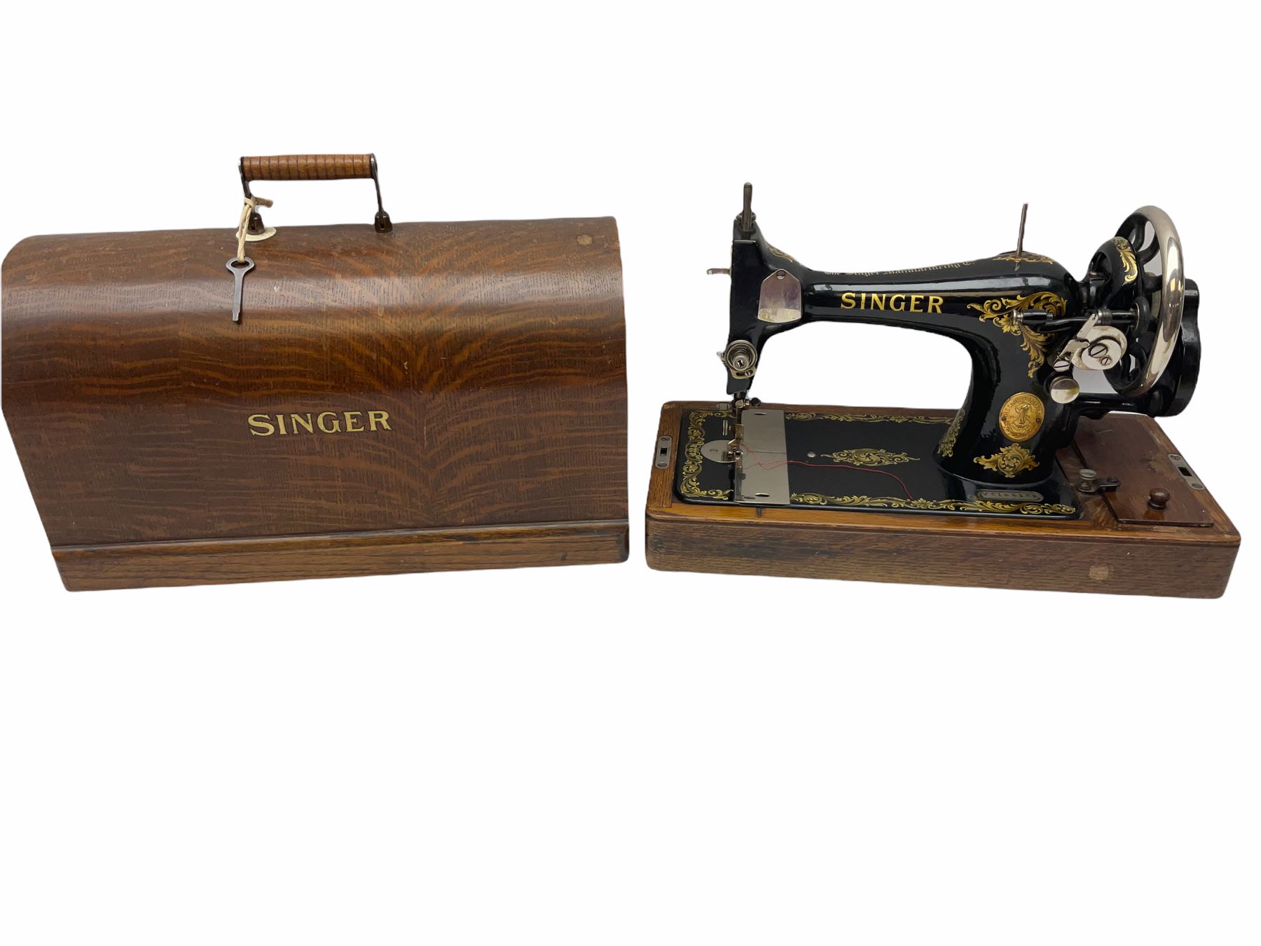 Cased vintage Singer hand sewing machine, with key, H29.5cm.