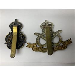 Nineteen Yeomanry metal cap badges including Derbyshire, Northamptonshire, Essex, Glamorgan, Staffordshire, City of London, Surrey, Shropshire, Hertfordshire etc; together with eleven Fusiliers badges including Lancashire, Royal Welch, Northumberland etc (30)