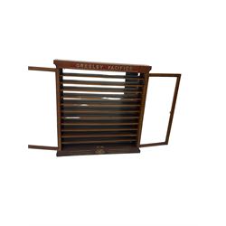 Modern hardwood display cabinet for model railway locomotives inscribed 'Gresley Pacifics' to the frieze and 'LNER' to the bottom rail; with mirrored back and ten loose fitting shelves enclosed by a pair of unglazed doors L101cm H108cm D16cm