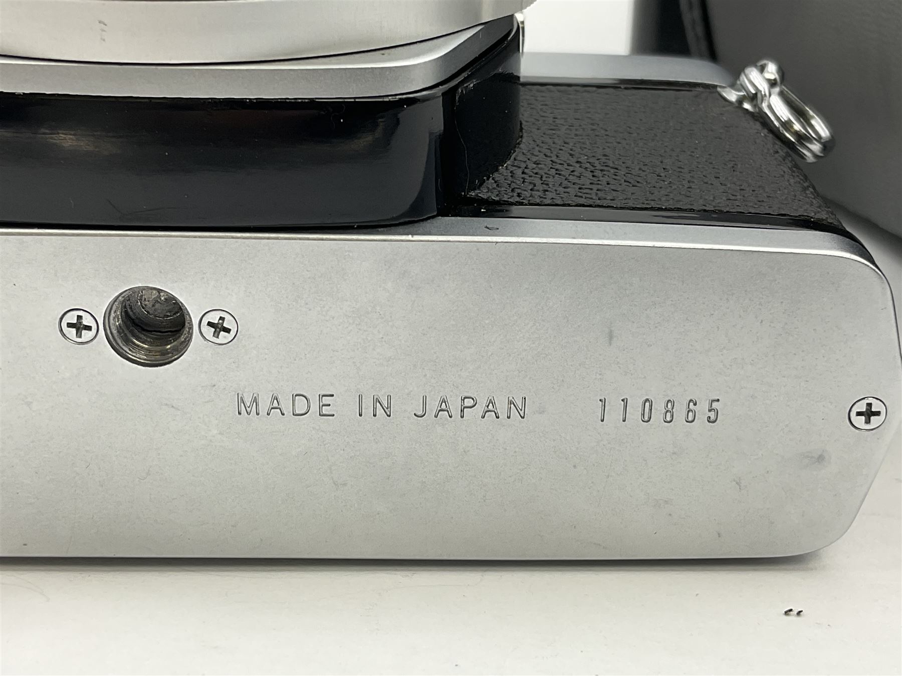 Olympus M-1 camera body, serial no. 110865, circa 1972, with ' Olympus M-System F.Zuiko Auto-S 1:1.8 f=50mm' lens, serial no. 105152, in leather case 