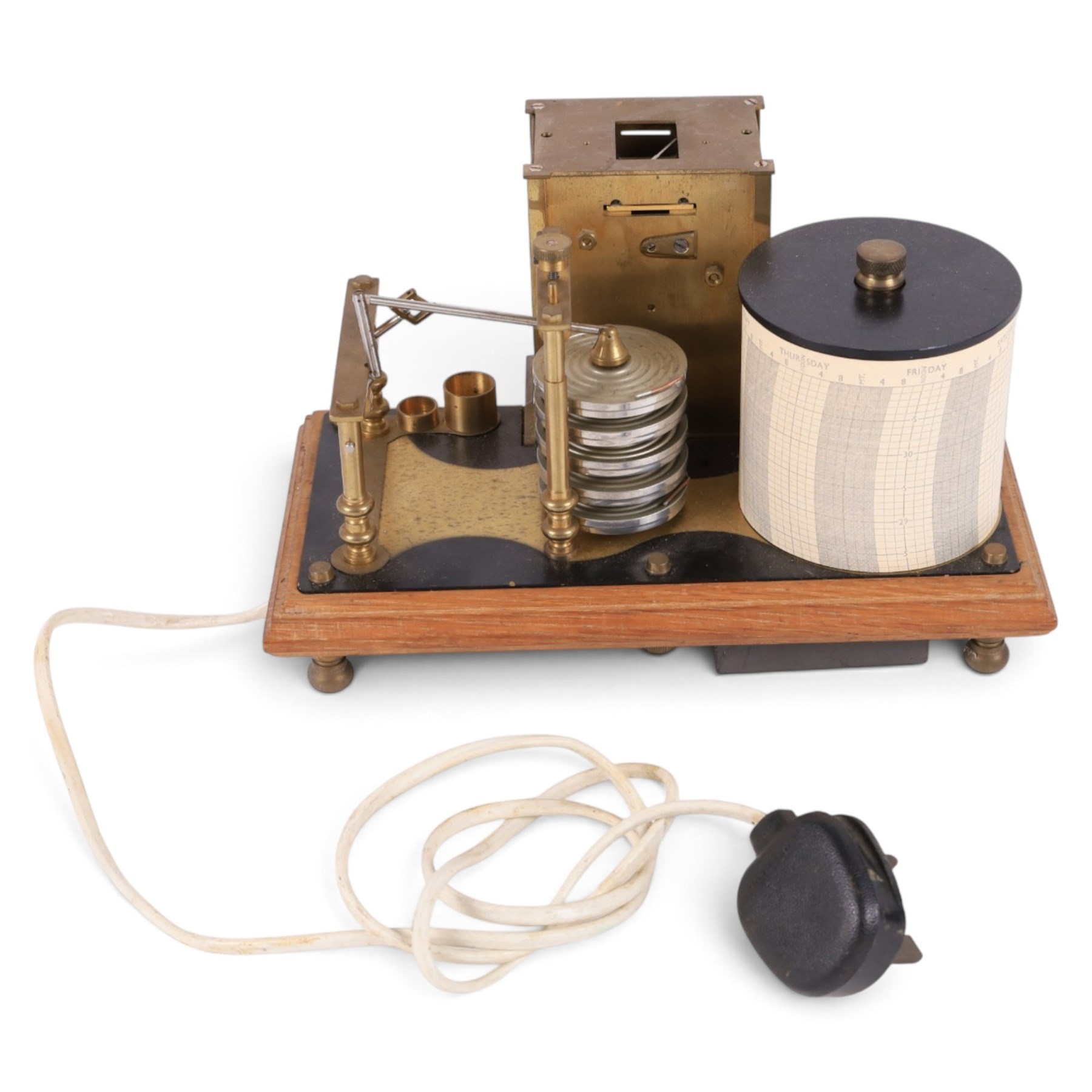 Brass barograph with integral brass clock, upon a wooden wooden plinth