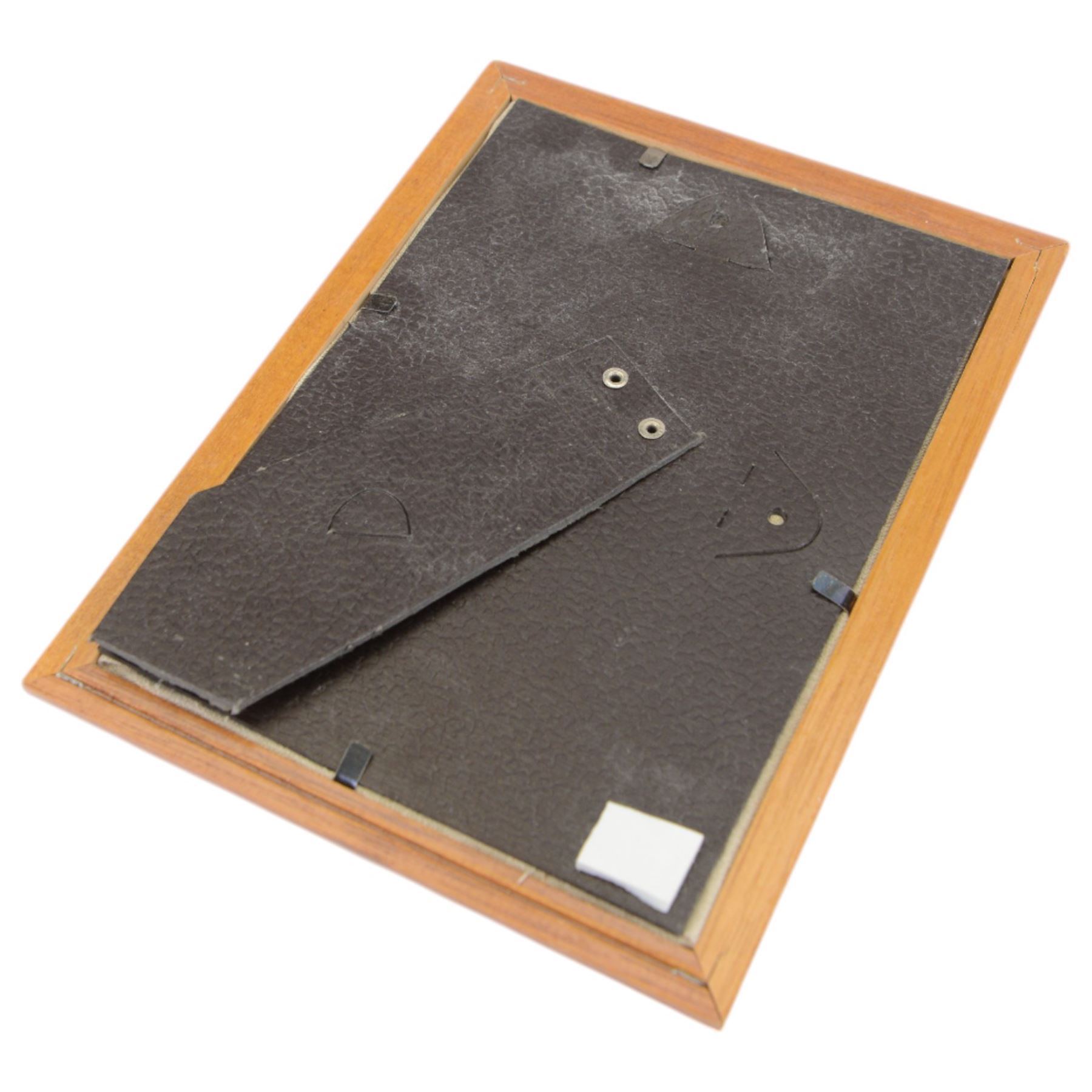 Four silkwork embroidery portraits, including two Dutch women, man smoking a pipe and a woman in period dress, all framed