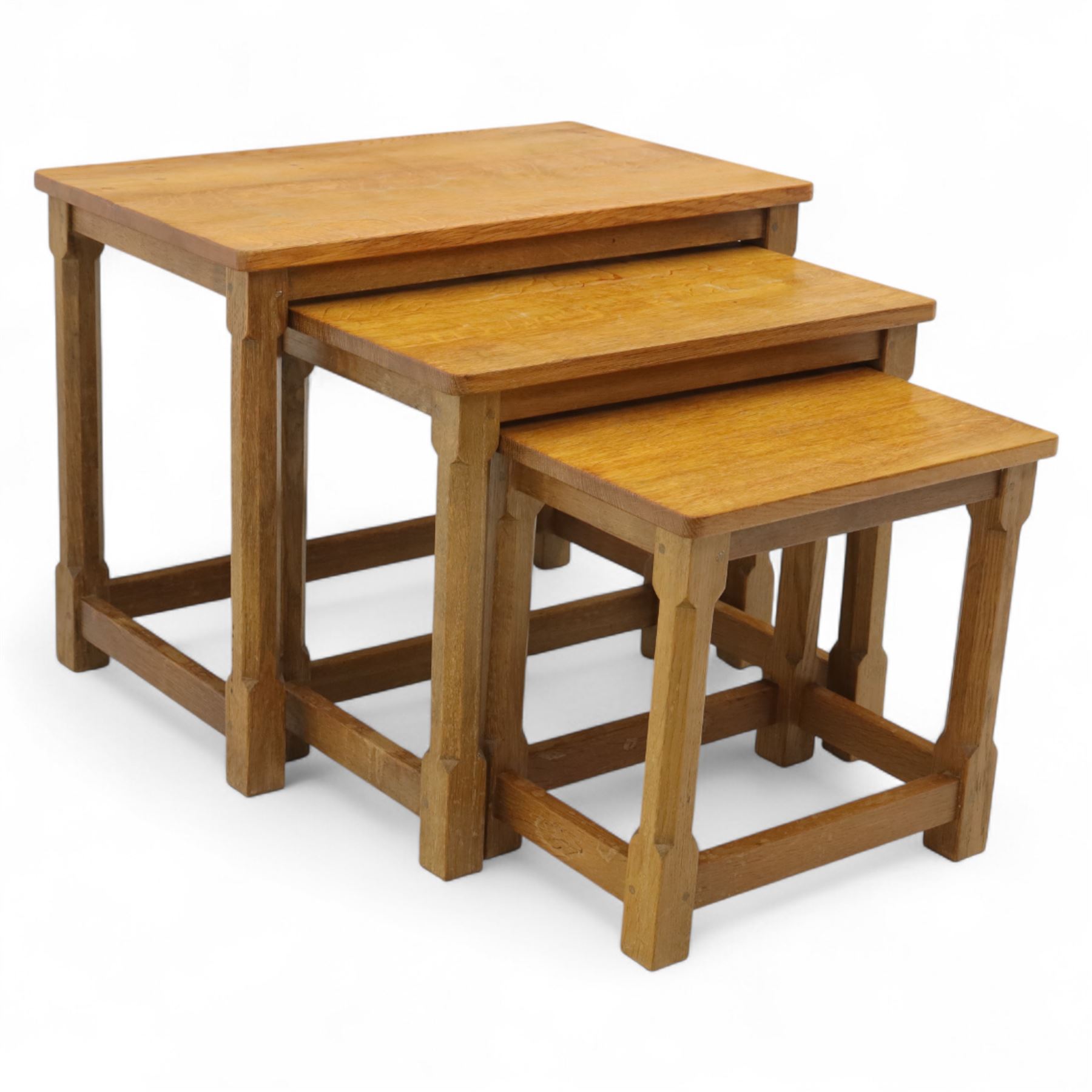 David 'Oakleafman' Langstaff - oak nest of three tables, each with a rectangular adzed top, with signature leaf motif on the bottom stretcher, from the workshop of David Langstaff, Easingwold, Yorkshire