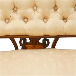 Edwardian inlaid mahogany sofa, upholstered in cream fabric with buttoned back rail, tapering legs on brass castors