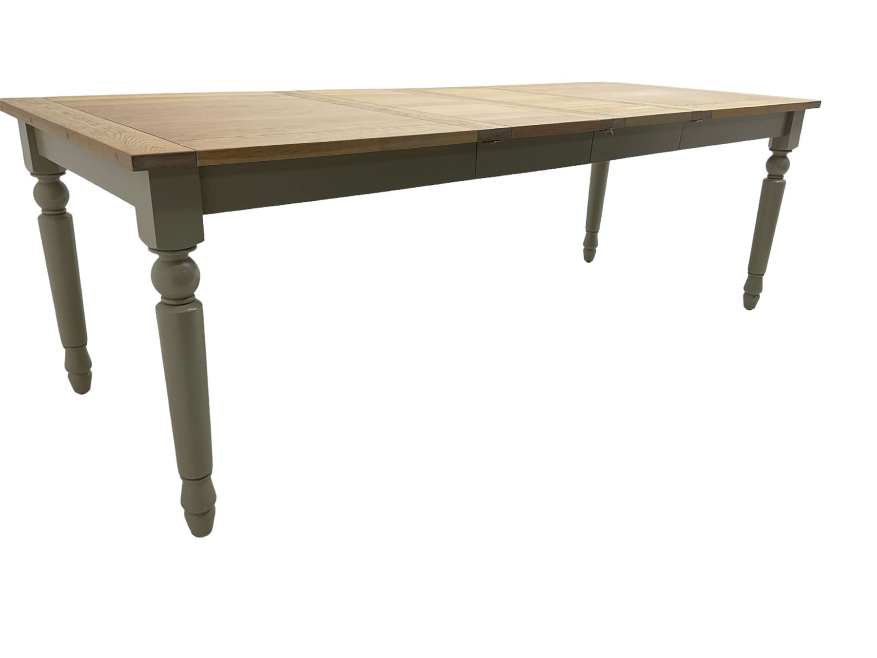 Neptune Furniture - 'Suffolk' oak dining table, pull-out extending top with two additional leaves, on turned supports, in grey paint and wax finish 
