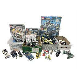 Large quantity of loose and boxed Lego of predominantly Batman and Star Wars interest, in four boxes