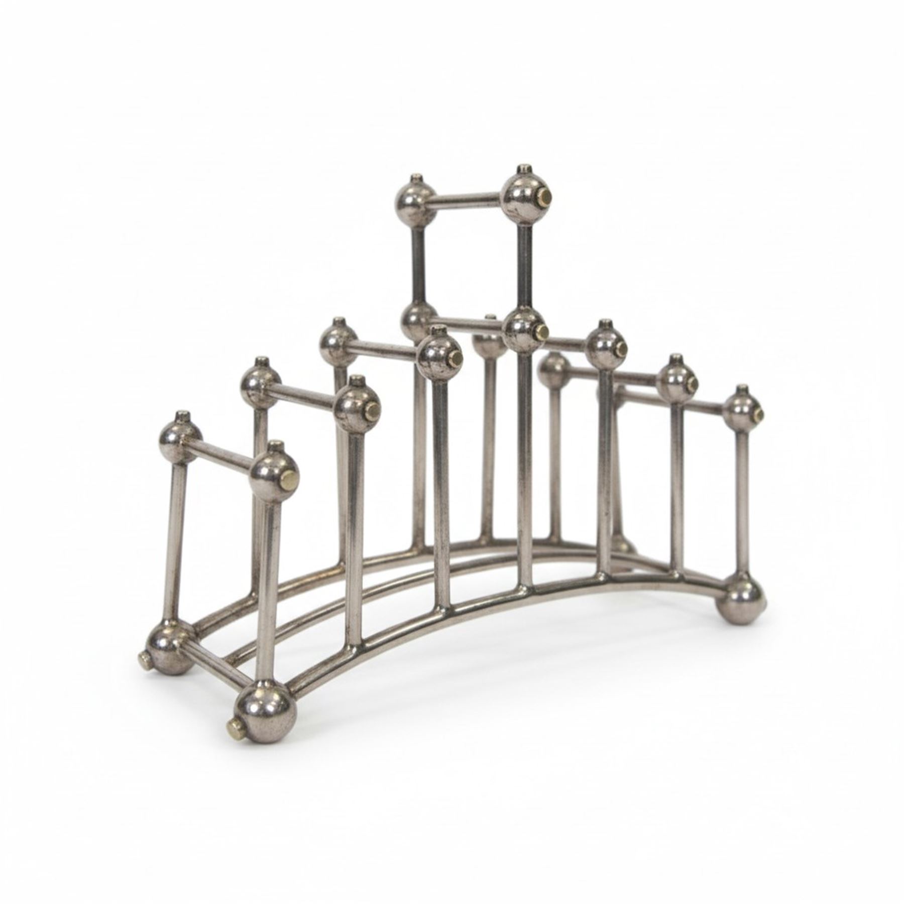 Christopher Dresser (1834-1904) for Hukin & Heath, silver plated six division bridge toast rack, circa 1880, Stamped makers marks and model number 2554, H12cm