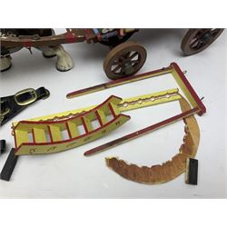 Two ceramic shire horse and gypsy caravans, together with horse brasses 