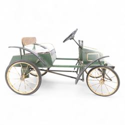 Triang child's pedal car in the style of a vintage automotive, likely a De Dion Bouton or an early Renault, painted in dark green with pale yellow details, H52cm