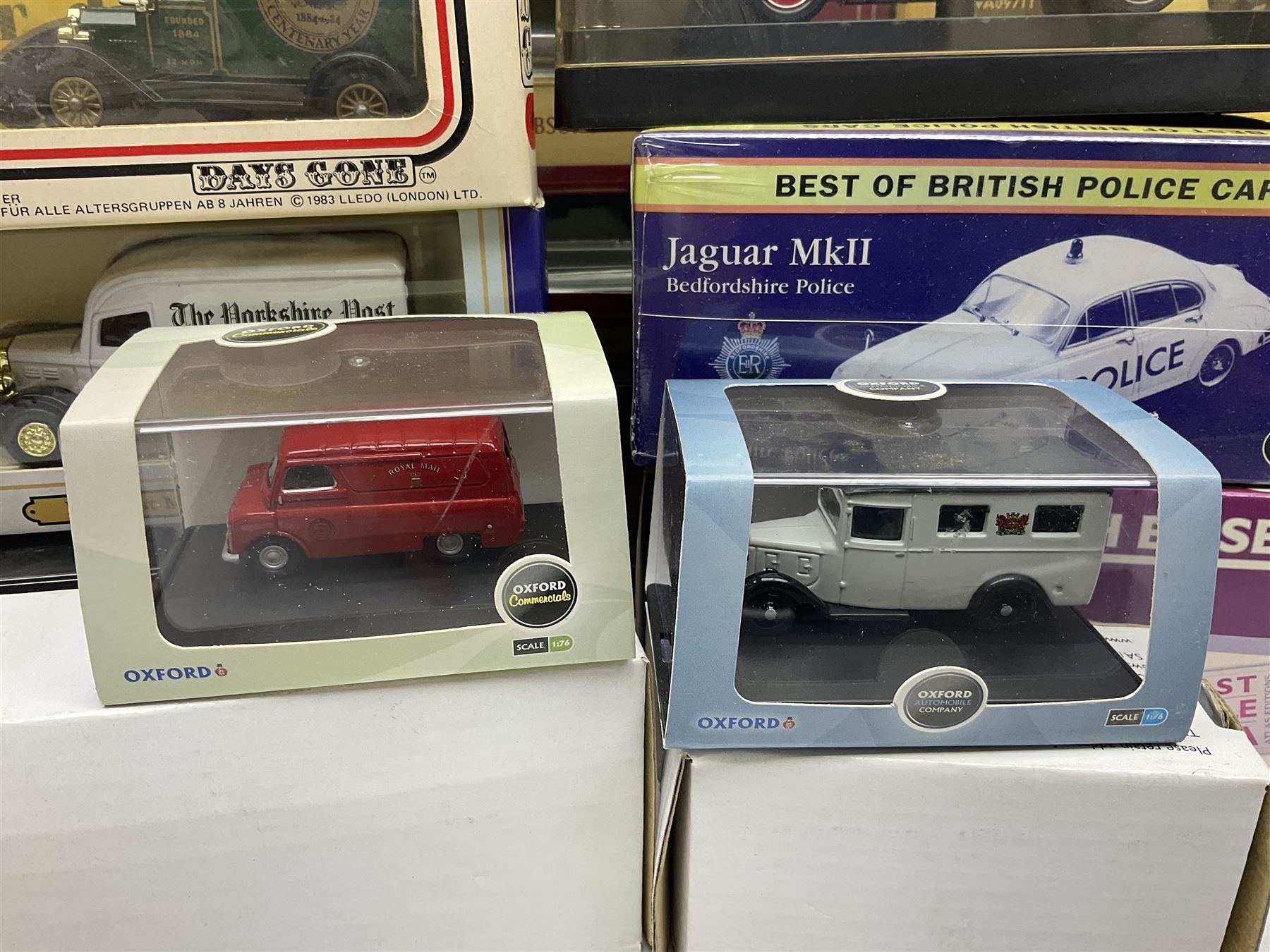 Eight Vanguards die-cast models by Corgi, Hornby and Lledo including Land Rovers, Ford Anglia and Triumph; together with thirteen other modern die-cast models by Bburago, Oxford, Atlas, EFE, Solido etc; all boxed; and small quantity of unboxed and playworn models

