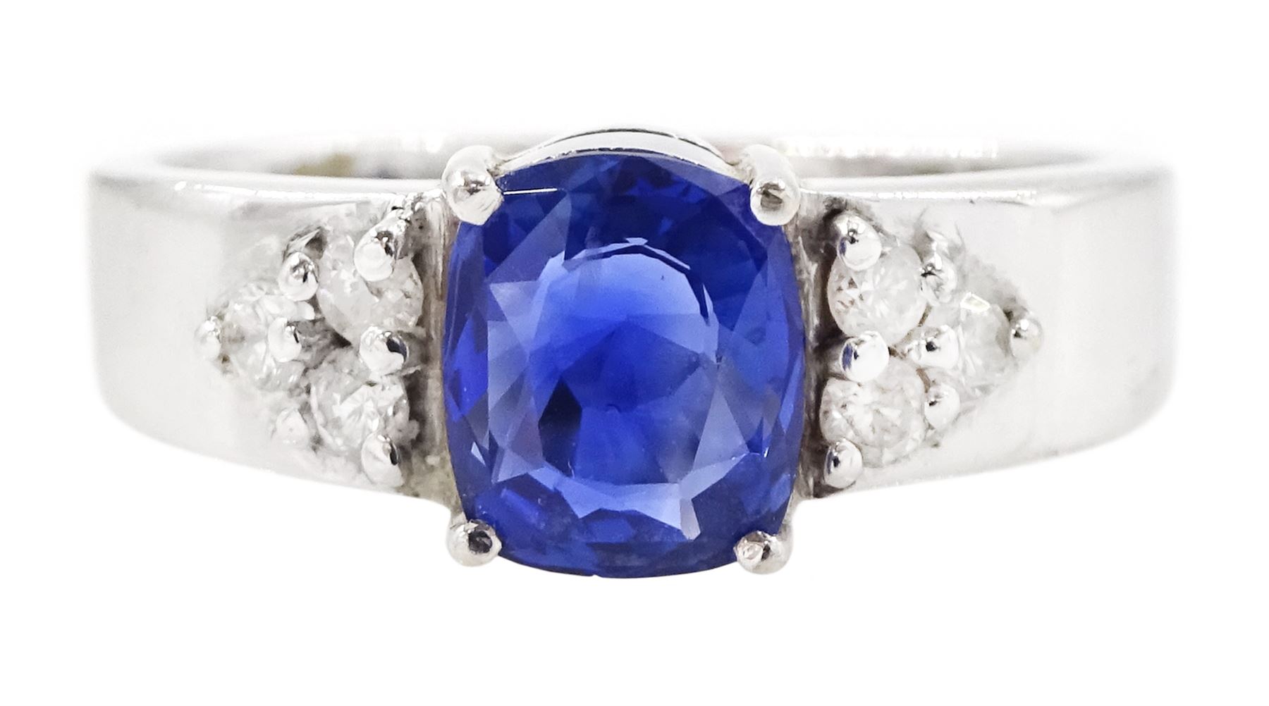 18ct white gold sapphire and diamond ring, cushion cut sapphire of approx 1.00 carat, with three round brilliant cut diamonds set either side, total diamond weight approx 0.10 carat
