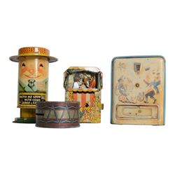 Ten vintage tin plate money boxes, including mechanical clown money bank, Chocolate Slot Machine, Watch Me Grow money box, mechanical Punch & Judy money box, etc, tallest H15cm