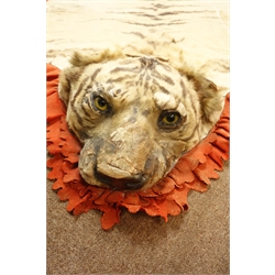  Taxidermy - Early 20th century Tiger skin rug with head mount, glass eyes, limbs outstretched, backed onto canvas backing with felt trim, W206cm x L330cm   