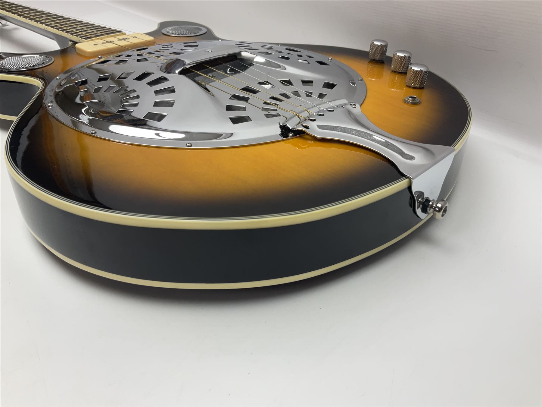 Eastwood of Canada Delta 4 electric four-string tenor resonator guitar with tobacco sunburst finish, serial no.1703437 L100cm; in original soft carrying case
