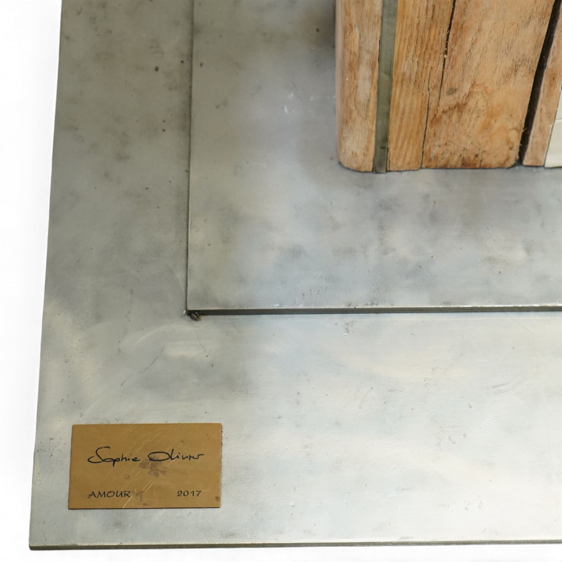 Sophie Olivier (French 1978-): ‘Amour’, 3D sculpture depicting Man & Woman, constructed from driftwood sections with inset ceramic elements and metalwork frames, mounted on a stepped metal base, applied with artist’s plaque and dated 2017