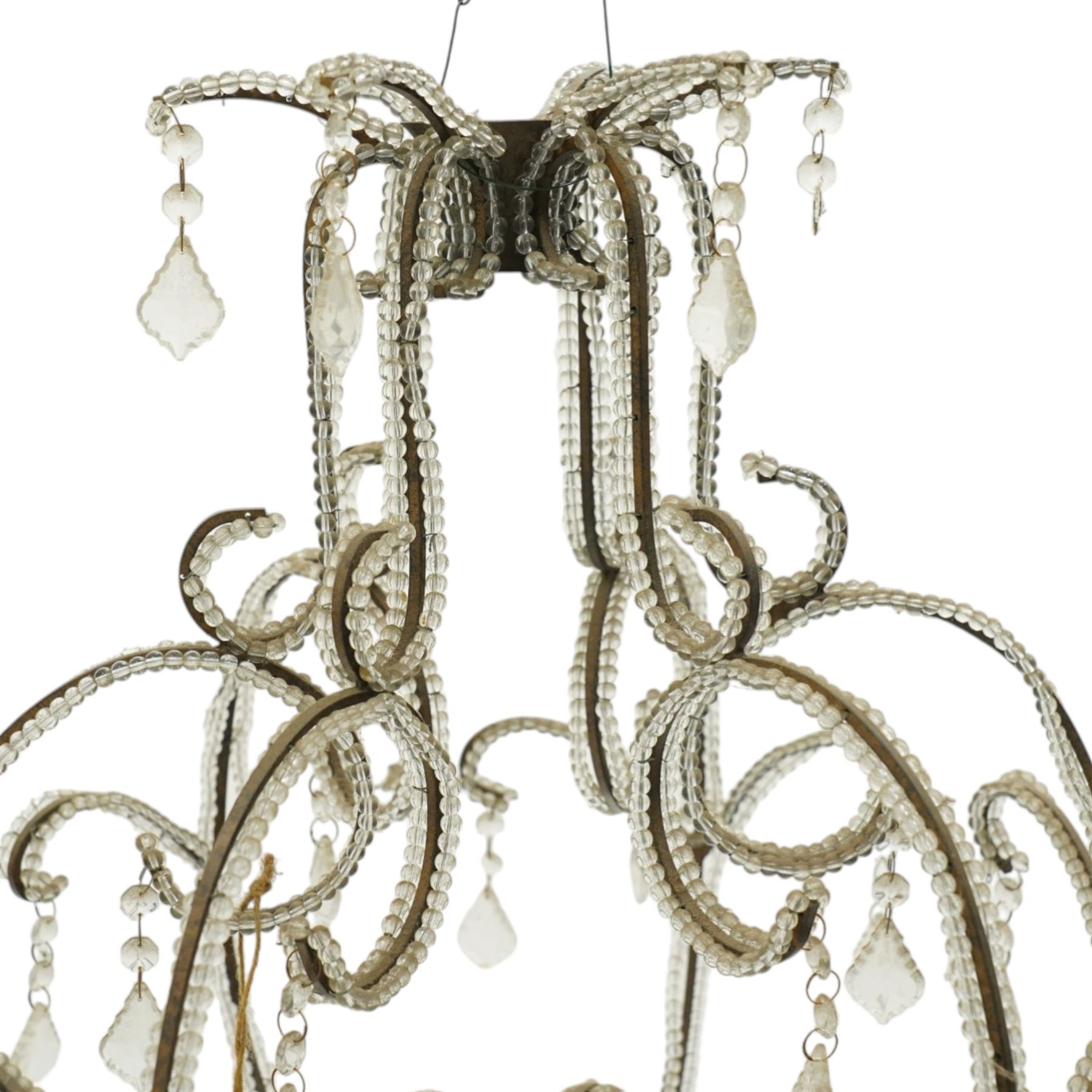 Contemporary decorative hanging chandelier frame, openwork painted metal scroll frame, with applied clear bead borders and hanging faceted glass pendants
