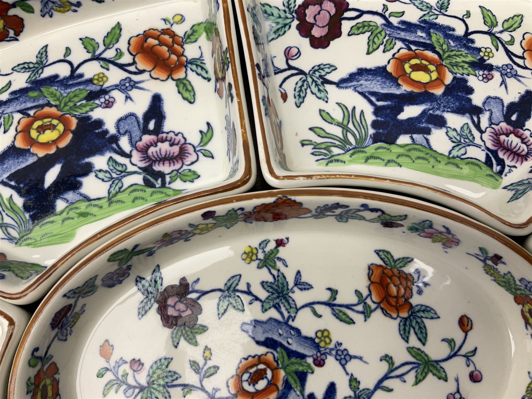 Booths Hors d'Oeuvres or supper set decorated in the Pompadour pattern, comprising seven dishes upon wooden tray L42.5cm, together with a bowl, D11.5cm, and six side plates, D19cm. 