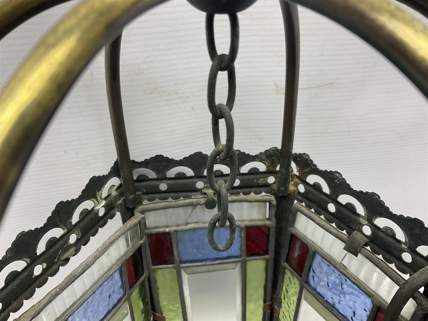 Victorian brass and stained leaded glass hall lantern, of hexagonal form, supported by four domed arms and pierced fret, H46cm W20cm