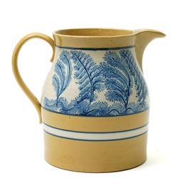 Late 19th century mocha ware jug, the yellow ground with cream and blue bands, and with typically decorated collar H18.5cm  