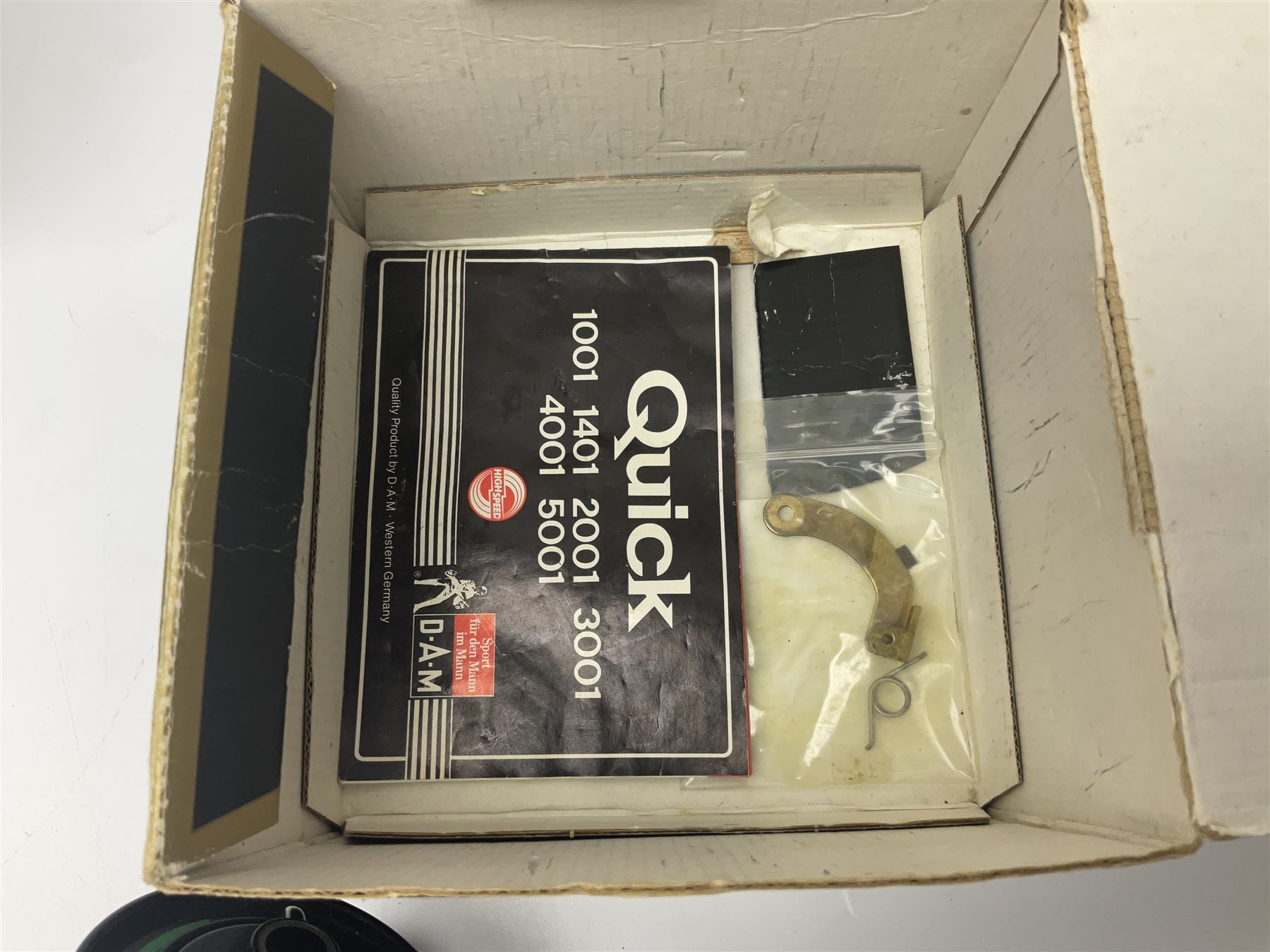 Four fixed spool reels, all in original boxes, comprising Shimano Ultegra 5500 XSD, with spare spool, Mitchell Autosurf 700, with spare spool, Shimano Sedona 600 FB with spare spool and D.A.M Quick 5001