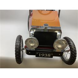 Red child's tin-plate pedal car with chrome detail, by Posh Paddles, Scarborough, H56cm, L80cm