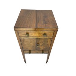 Georgian mahogany washstand cabinet, the double hinged lid opens to reveal wash basin and lift up tilting mirror, false drawer over double cupboard and drawer, on square supports with brass cups and castors