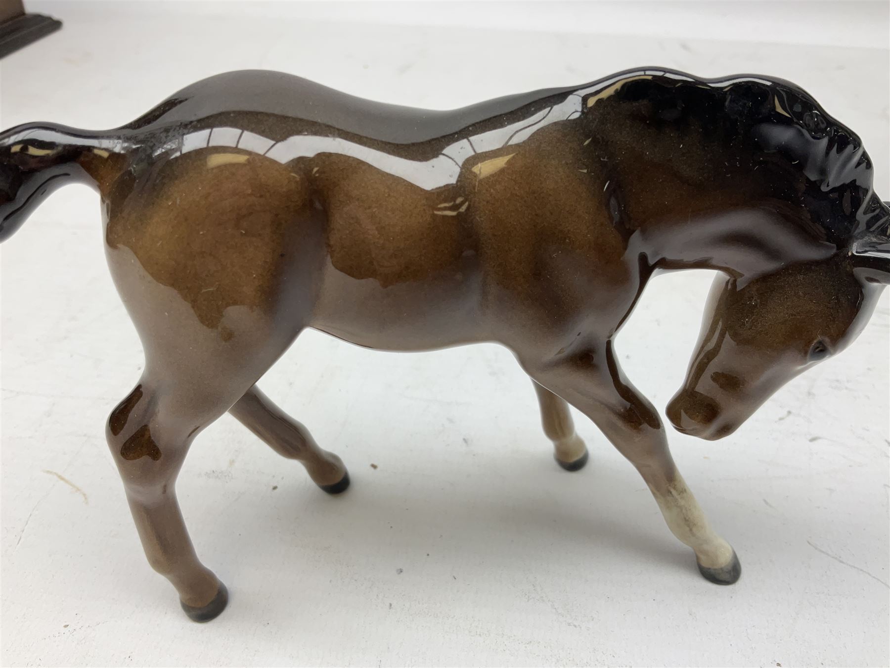 Six Beswick figures of bay horses, including large hunter no.1734, Shire horse no.818, horse with tucked head no.1549, etc (6)