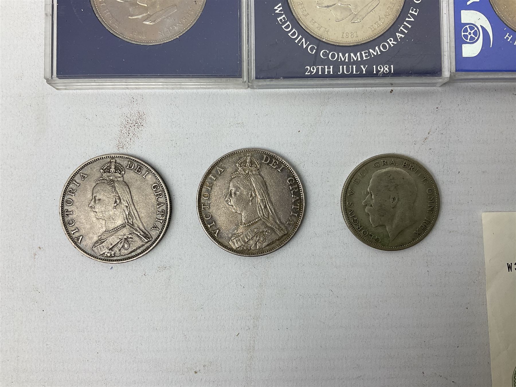 Great British and World coins including Queen Victoria 1887 and 1888 double florins, King George V 1929 halfcrown, King George VI 1951 Festival of Britain crown, commemorative crowns, Queen Elizabeth II 1953 nine coin set in blister pack, 1989 and 1995 two pound coins, various pre-decimal pennies and other coinage