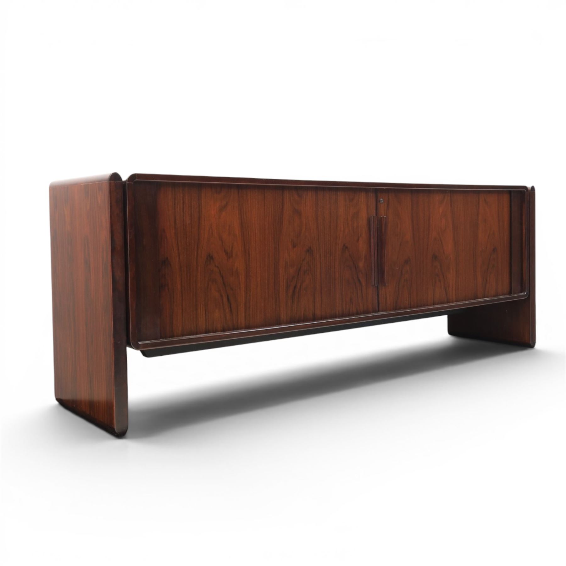 Dyrlund - contemporary Santos rosewood office sideboard of minimalist form with clean lines, rectangular top with integrated side supports, left side with two drawers, and right side with a filing drawer, all enclosed by tambour sliding doors